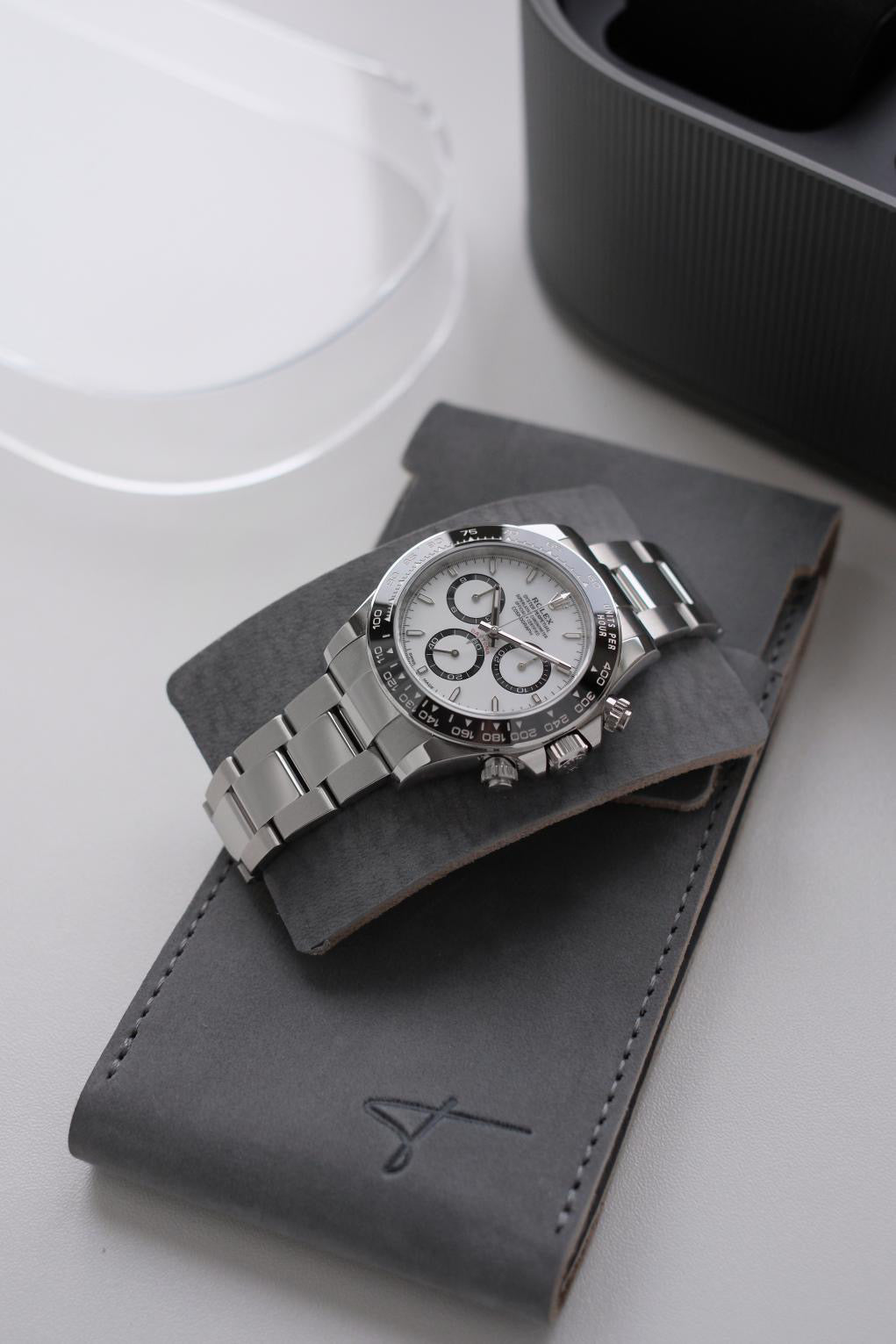 Gray suede watch pouch by Talecraft, lifestyle view